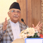 PM KP Sharma Oli addressing middlemen accusations and criticizing opposition. Prime Minister KP Sharma Oli addressing the Madan Bhandari Foundation conference, responding to middlemen allegations.